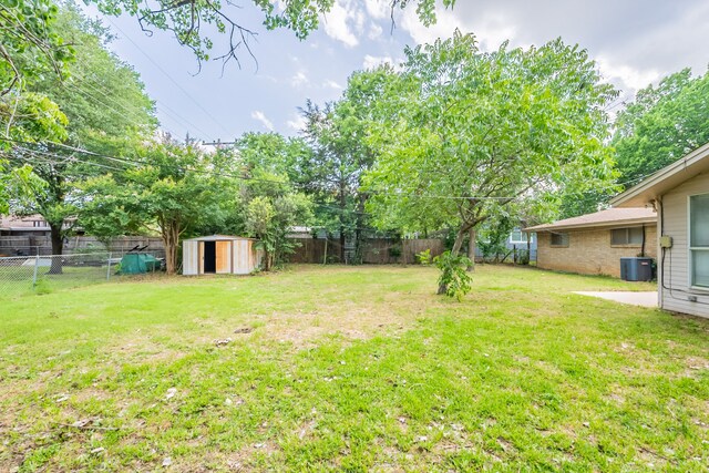 5905 Wheaton Dr, Fort Worth, TX 76133 - fenced backyard with a storage unit