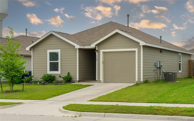 3165 Crestone Dr, Crandall, TX 75114 - ranch-style house featuring a garage, driveway, a front lawn, and roof with shingles