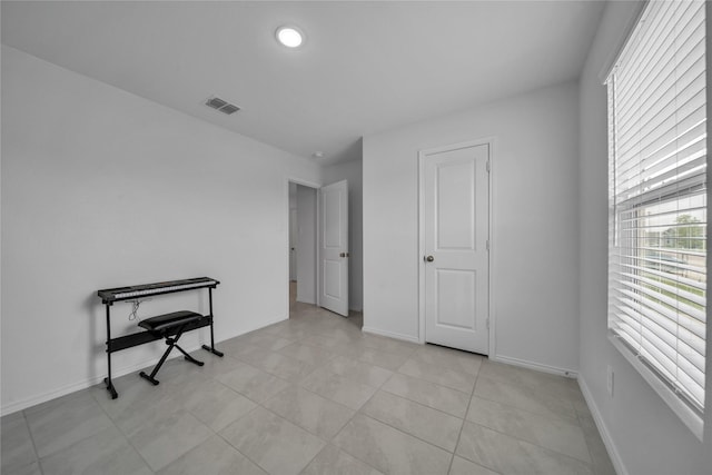 3165 Crestone Dr, Crandall, TX 75114 - unfurnished room with baseboards and light tile patterned flooring