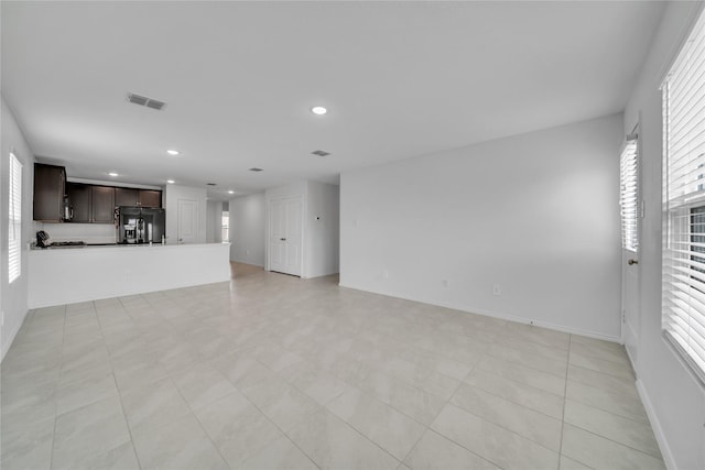 3165 Crestone Dr, Crandall, TX 75114 - unfurnished living room featuring recessed lighting and baseboards