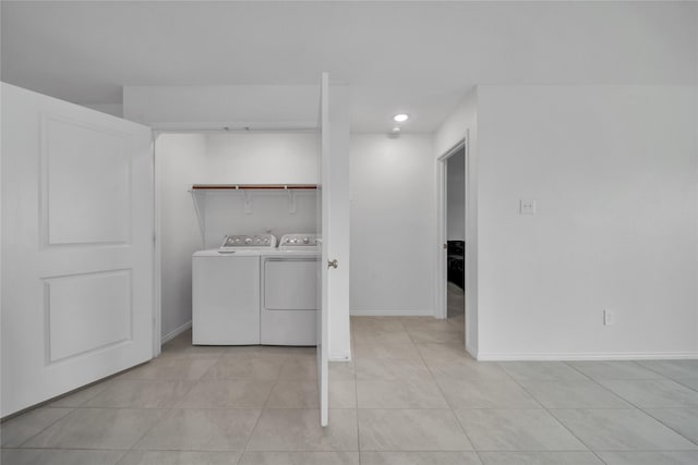 3165 Crestone Dr, Crandall, TX 75114 - laundry room featuring washing machine and clothes dryer, light tile patterned floors, and recessed lighting