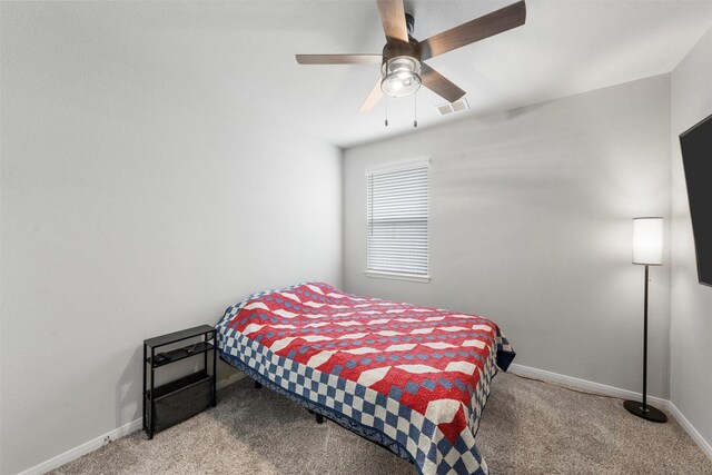 6932 Sulphur Ct, China Spring, TX 76633 - carpeted bedroom with baseboards and a ceiling fan