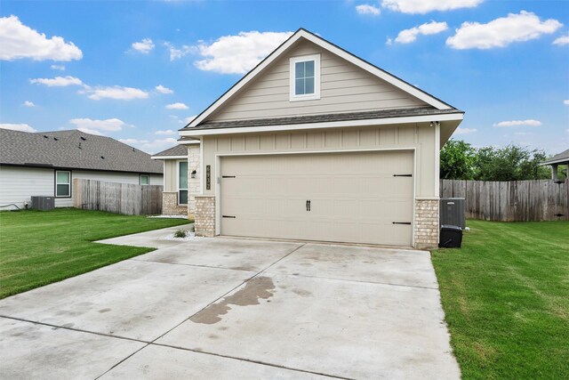 6932 Sulphur Ct, China Spring, TX 76633 - view of front of home with a garage, brick siding, board and batten siding, roof with shingles, and driveway