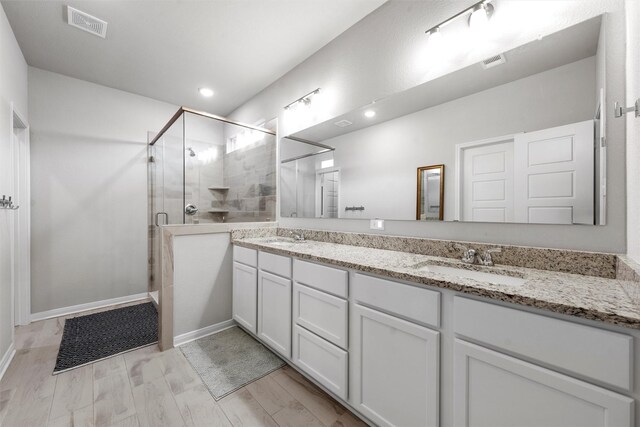 6932 Sulphur Ct, China Spring, TX 76633 - full bath featuring double vanity, a shower stall, and recessed lighting