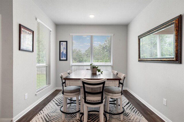 6932 Sulphur Ct, China Spring, TX 76633 - dining room featuring dark wood-style floors and baseboards