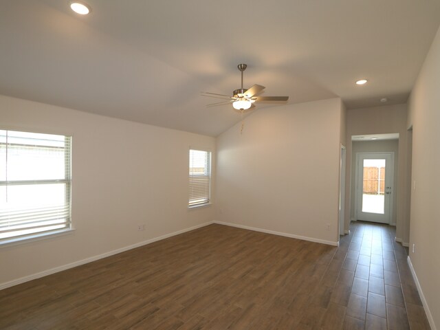 14142 Maida Dr, Pilot Point, TX 76258 - spare room featuring ceiling fan, dark wood-style floors, recessed lighting, and vaulted ceiling
