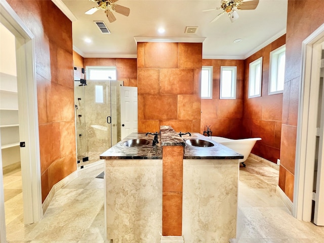 1016 Santiago Trl, Wylie, TX 75098 - full bathroom with a ceiling fan, ornamental molding, a shower stall, a freestanding bath, and tile walls