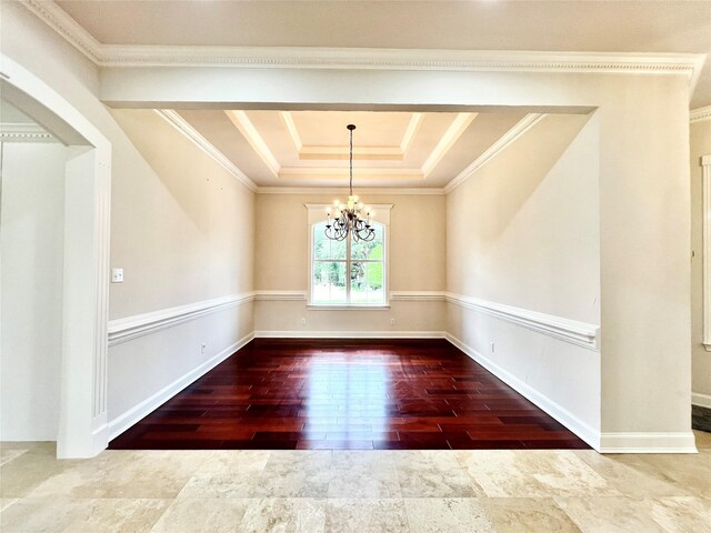 1016 Santiago Trl, Wylie, TX 75098 - unfurnished room with wood finished floors, a chandelier, ornamental molding, a tray ceiling, and arched walkways