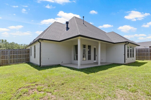255 Kathryns Ct, Mount Pleasant, TX 75455 - back of house with a patio and a shingled roof