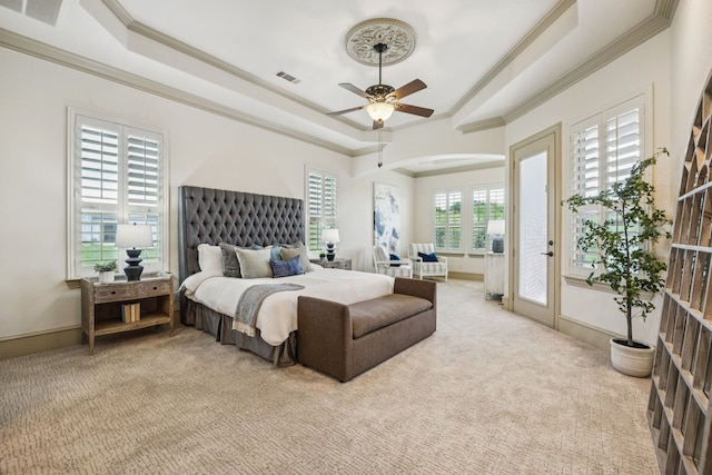 211 Tanner Creek Cir, Sunnyvale, TX 75182 - bedroom with a tray ceiling, access to exterior, light colored carpet, ornamental molding, and a ceiling fan