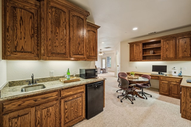 211 Tanner Creek Cir, Sunnyvale, TX 75182 - kitchen featuring black appliances, built in study area, light colored carpet, open shelves, and light stone countertops