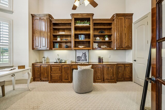 211 Tanner Creek Cir, Sunnyvale, TX 75182 - office space with built in desk, a ceiling fan, and light colored carpet
