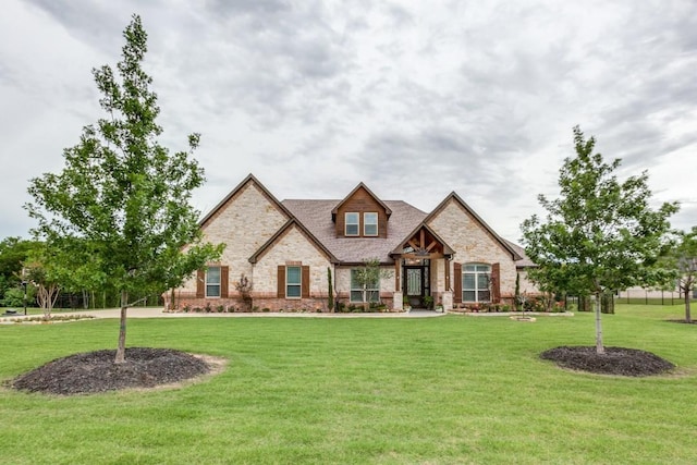 217 The Falls Dr, Sunnyvale, TX 75182 - craftsman-style house with stone siding and a front lawn