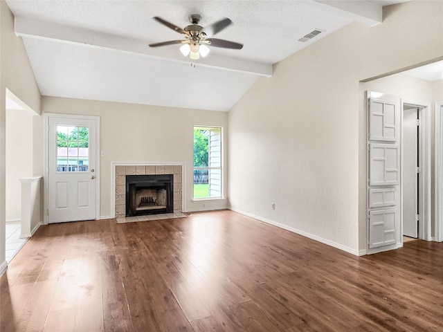631 Sharp St, Mansfield, TX 76063 - unfurnished living room with healthy amount of natural light, a ceiling fan, and wood finished floors