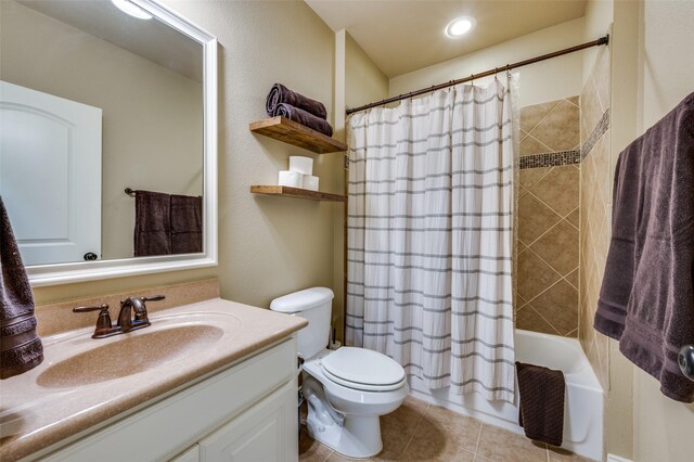 917 Stone Cottage Ln, Mckinney, TX 75069 - bathroom featuring vanity, shower / bathtub combination with curtain, tile patterned flooring, and recessed lighting