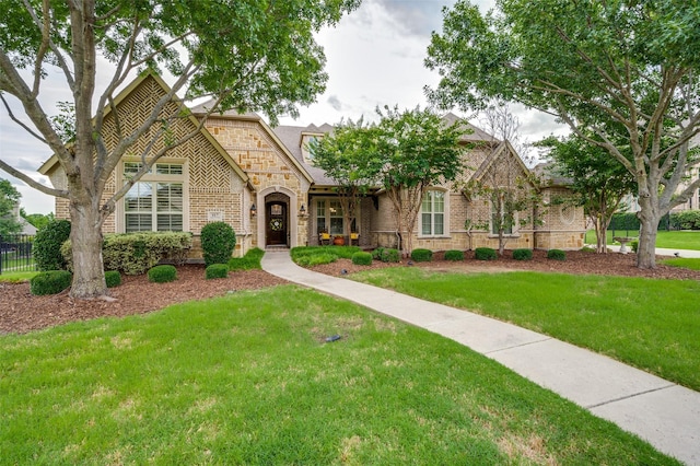 917 Stone Cottage Ln, Mckinney, TX 75069 - view of front of house featuring brick siding and stone siding