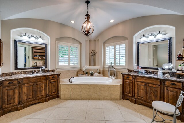 917 Stone Cottage Ln, Mckinney, TX 75069 - full bathroom with a bath, two vanities, tile patterned floors, recessed lighting, and a chandelier
