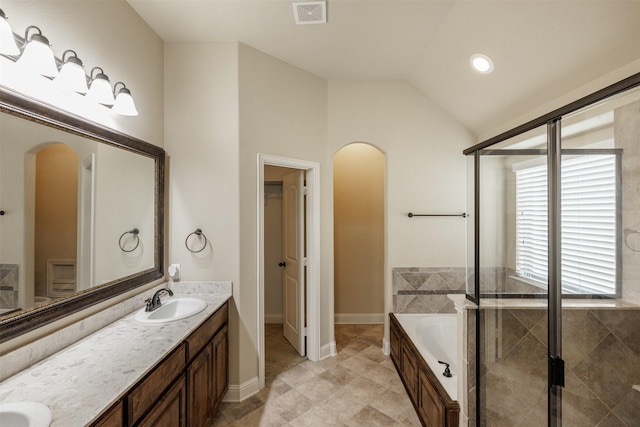 1701 Fair Oaks Ln, Royse City, TX 75189 - bathroom featuring a garden tub, double vanity, vaulted ceiling, a stall shower, and recessed lighting