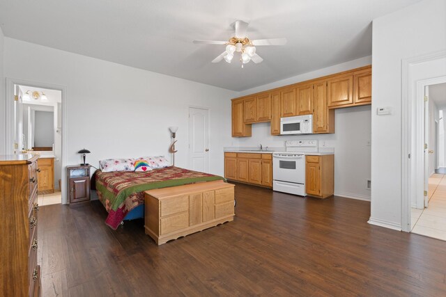 2008 Natchez Ct, Cleburne, TX 76033 - bedroom with dark wood-style floors and ensuite bath