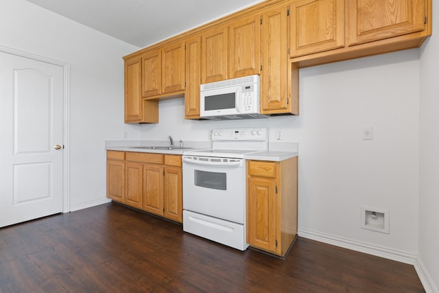 2008 Natchez Ct, Cleburne, TX 76033 - kitchen featuring white appliances, light countertops, and dark wood-type flooring