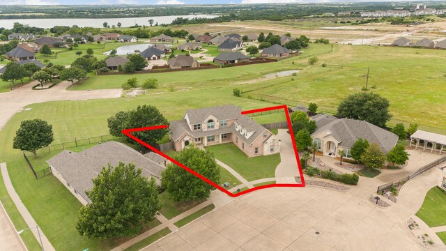 2008 Natchez Ct, Cleburne, TX 76033 - aerial view of residential area featuring property boundaries highlighted and a large body of water