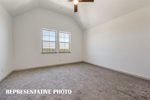 428 Parkside Dr, Argyle, TX 76226 - carpeted empty room featuring ceiling fan and vaulted ceiling