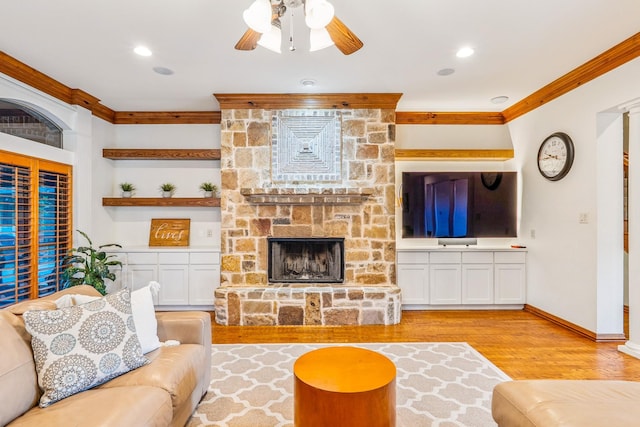 10133 Leaping Buck Pt, Fort Worth, TX 76126 - living area featuring crown molding, a fireplace, ceiling fan, light wood-style flooring, and recessed lighting