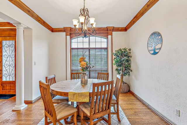 10133 Leaping Buck Pt, Fort Worth, TX 76126 - dining space with a chandelier, crown molding, light wood finished floors, and ornate columns