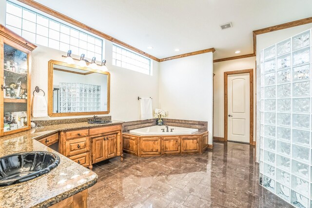 10133 Leaping Buck Pt, Fort Worth, TX 76126 - full bath featuring a garden tub, ornamental molding, and vanity