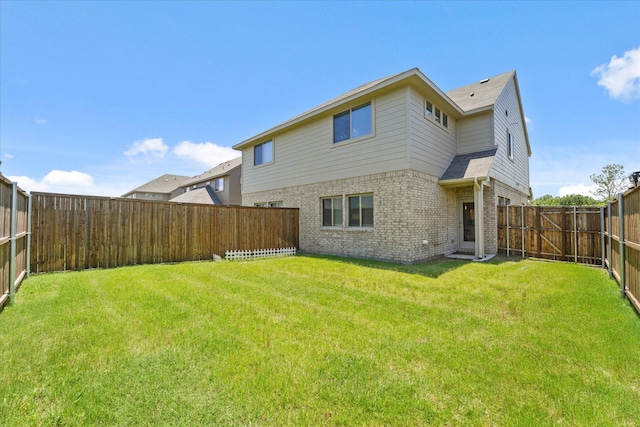 3109 Ethan Ln, Wylie, TX 75098 - back of house featuring brick siding and a fenced backyard