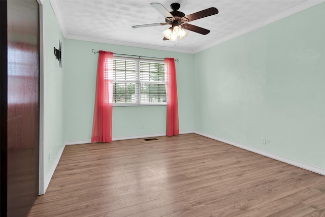 706 W Cheri Ann Dr W, Bells, TX 75414 - spare room featuring wood finished floors, a ceiling fan, and ornamental molding