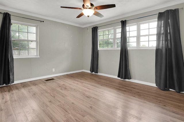 706 W Cheri Ann Dr W, Bells, TX 75414 - empty room featuring wood finished floors, ceiling fan, and crown molding