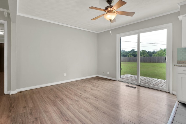 706 W Cheri Ann Dr W, Bells, TX 75414 - unfurnished room with light wood-style floors, a ceiling fan, and crown molding