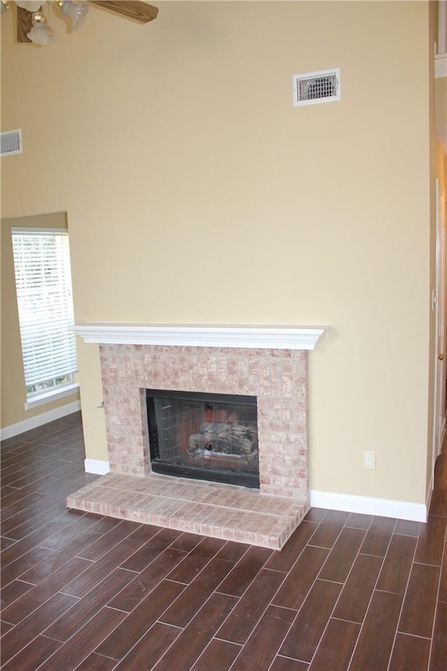2501 Windchase Dr, Flower Mound, TX 75028 - detailed view of wood finished floors and a fireplace