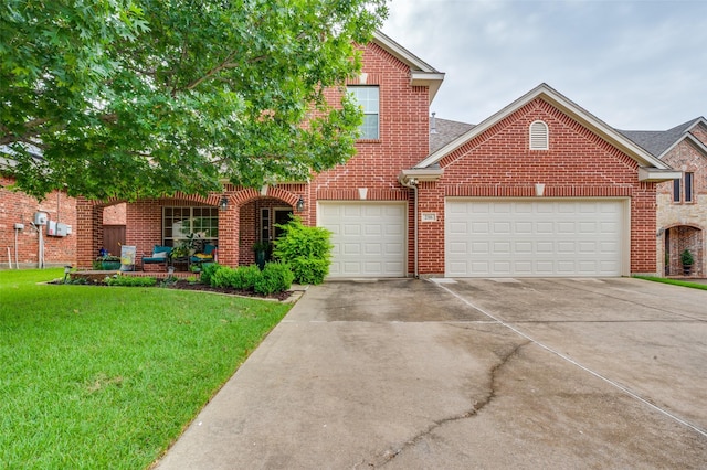 216 Barkley Dr, Hickory Creek, TX 75065 - traditional-style house with brick siding, driveway, a front lawn, and an attached garage