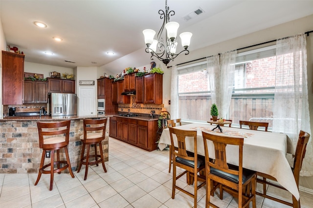 216 Barkley Dr, Hickory Creek, TX 75065 - dining space with light tile patterned floors, a chandelier, and recessed lighting