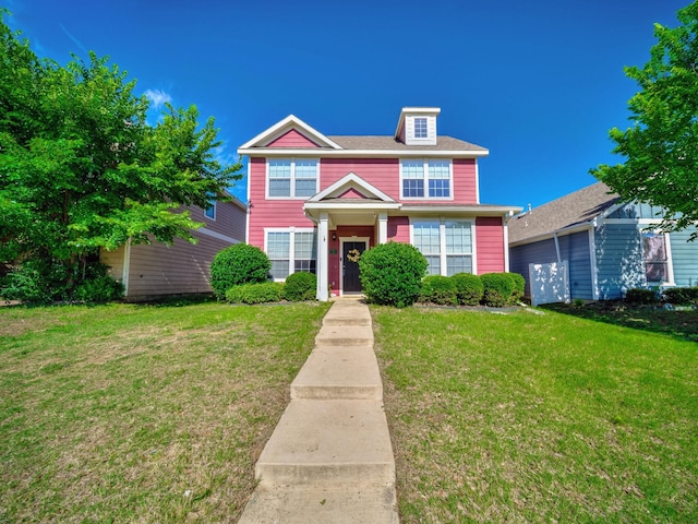 2021 Prospect Ln, Providence Village, TX 76227 - traditional home featuring a front yard
