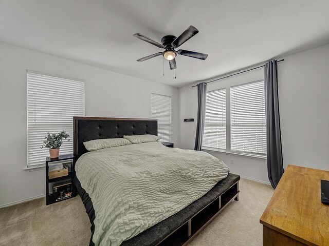 2021 Prospect Ln, Providence Village, TX 76227 - bedroom with light colored carpet and a ceiling fan