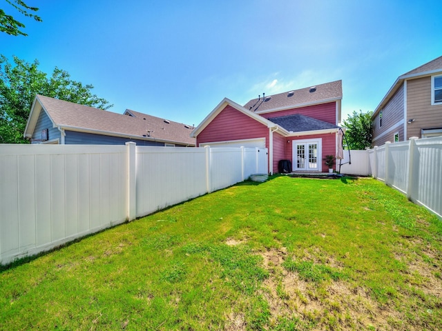 2021 Prospect Ln, Providence Village, TX 76227 - fenced backyard with french doors