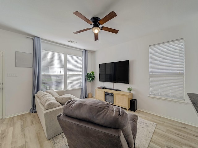 2021 Prospect Ln, Providence Village, TX 76227 - living area with a ceiling fan and light wood finished floors