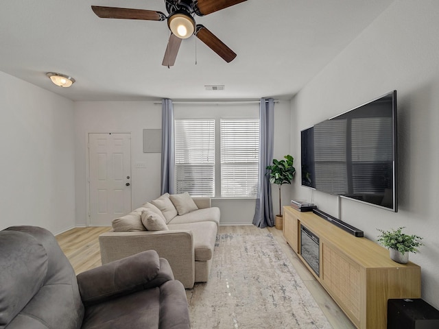 2021 Prospect Ln, Providence Village, TX 76227 - living area with ceiling fan and light wood-style flooring