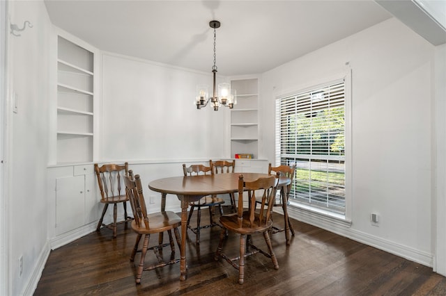 82 Vaughn Dr, Denison, TX 75020 - dining space featuring built in shelves, wood finished floors, and a chandelier