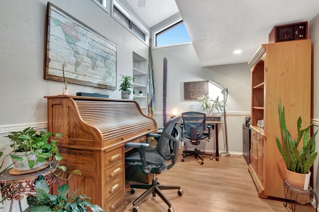 3003 Rustling Leaves Ln, Bedford, TX 76021 - home office with light wood-type flooring, lofted ceiling, wainscoting, and recessed lighting