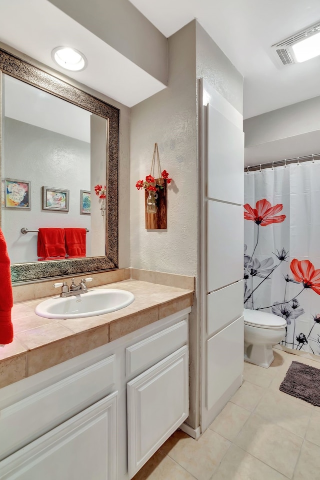 3003 Rustling Leaves Ln, Bedford, TX 76021 - bathroom with tile patterned floors and vanity