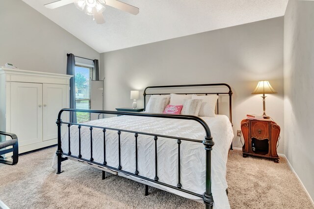 3003 Rustling Leaves Ln, Bedford, TX 76021 - bedroom featuring light carpet, vaulted ceiling, and a ceiling fan