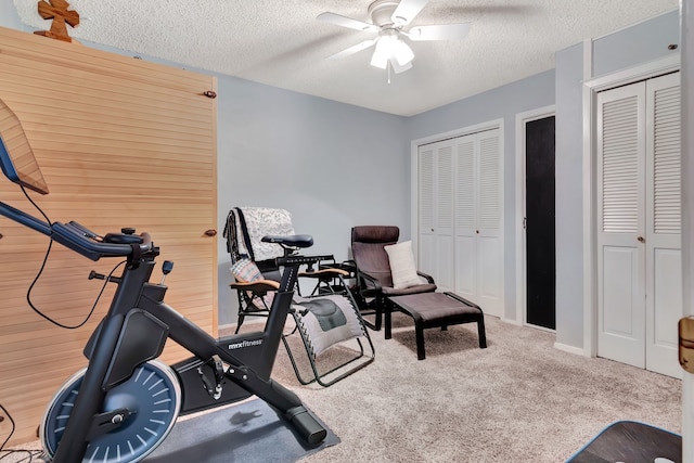 3003 Rustling Leaves Ln, Bedford, TX 76021 - exercise area featuring a ceiling fan, carpet floors, and a textured ceiling