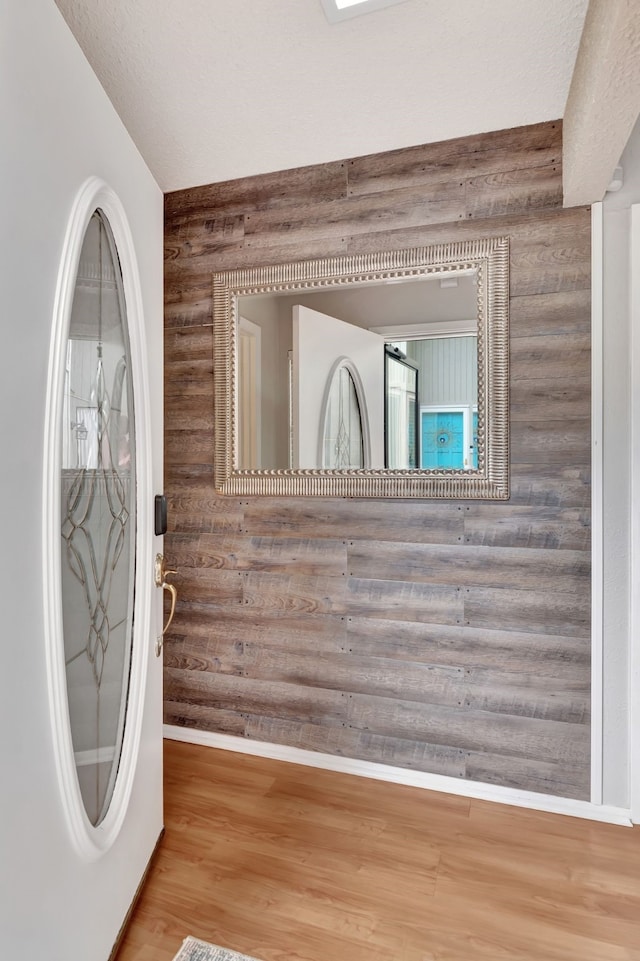 3003 Rustling Leaves Ln, Bedford, TX 76021 - foyer with wood finished floors and baseboards