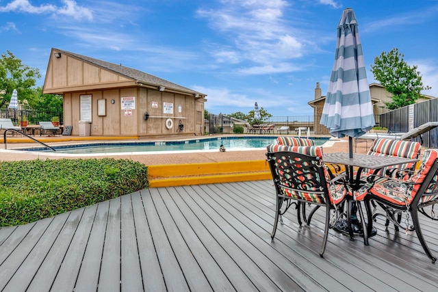 3003 Rustling Leaves Ln, Bedford, TX 76021 - wooden deck featuring a community pool