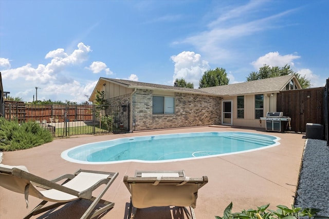 4043 Star Trek Ln, Garland, TX 75044 - view of pool with a patio area and grilling area