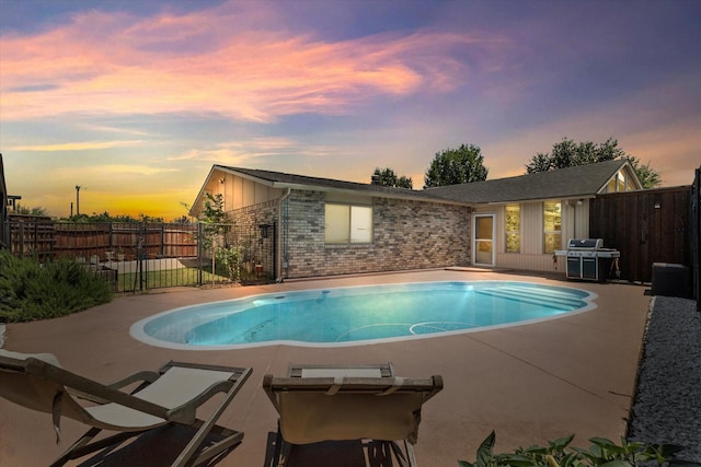 4043 Star Trek Ln, Garland, TX 75044 - view of swimming pool with a patio